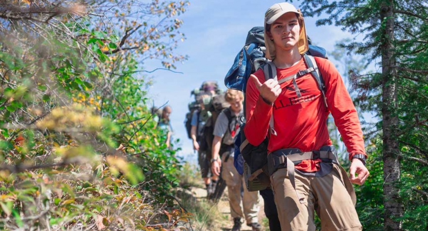 young adults backpacking in the boundary waters